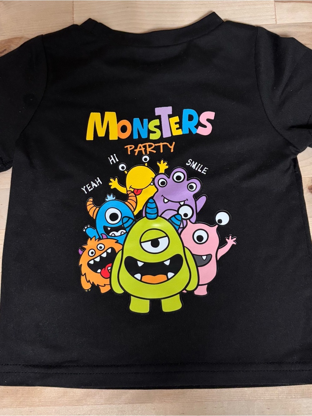 SHEIN Black 'Monsters Party' Graphic Tee with Colorful Monster Print